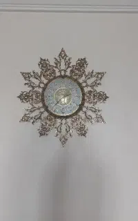 ساعت برنجی طرح خورشید