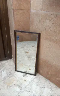 آیینه دیواری دور قاب شده