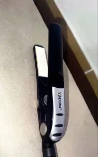 اتو موی برقی