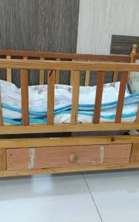 گهواره و پشه بند نوزاد