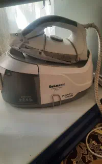 اتو مخزن دار