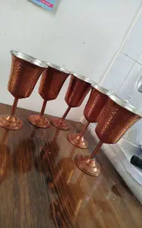 مجسمه برنز و وسایل مسی