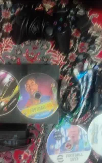 پی اس 2 به همراه 5 سیدی بازی و یک عدد دست