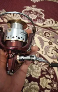 چرخ ماهیگیری آک آک