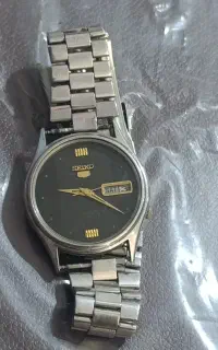 ساعت سیکو 5ژاپنی و دوربین عکاسی سالم سالم