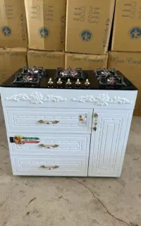اجاق گاز رویه شیشه ایی فندک دار ۲ سال گارانتی