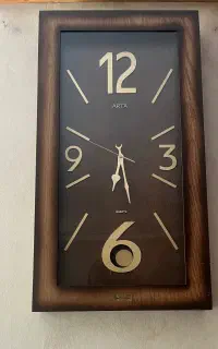 ساعت دیواری چوبیarta