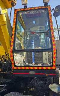 بیل مکانیکی لاستیکی