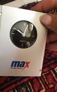 ساعت دکوری همراه با قاب عکس