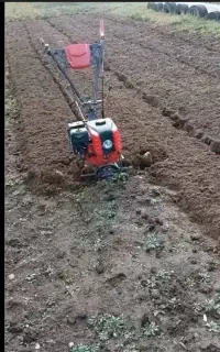 خدمات باغبانی شخم زدن باغ با تیلر کولتیواتور