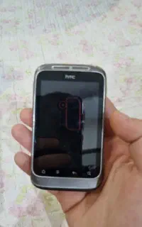 گوشی موبایل htc به همراه هندزفیری