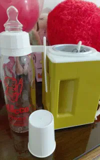 گرمکن شیشه شیر به همراه شیشه شیر چیکوی اصل