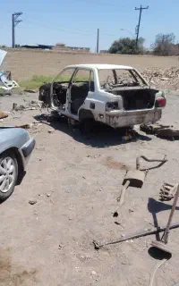 ماشین اسقاطی اروقی سوخته تصادفی دو تیکه