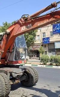 بیل مکانیکی اطلس 1304 لاستیکی معاوضه