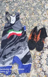 یک جفت کفش و دوبنده کشتی