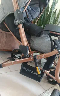 کالسکه و لباس کودک