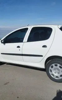 پژو سفید206تیپ 2عروسک