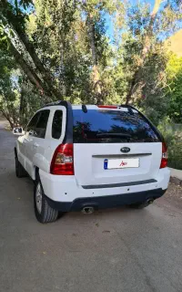 اسپورتیج مدل ۲۰۱۰ سفید فول یک لکه رنگ