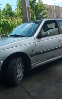 سواری پژو پارس نقره ای رنگ