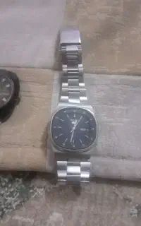 ساعت سیتیزن و سکو پنج