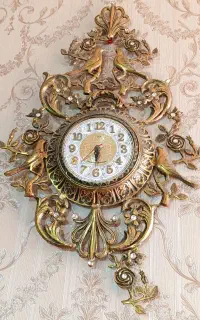 دلفین و اسب برنزی و ساعت