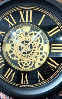 ساعت دیواری جنس بدنه پلاستیک.آرام گرد