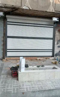 نصب و تعمیر کرکره برقی شیشه سکوریت جک بازویی