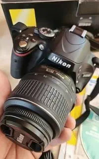 دوربین عکاسی نیکون D5100 زیر قیمت باتمام لوازم