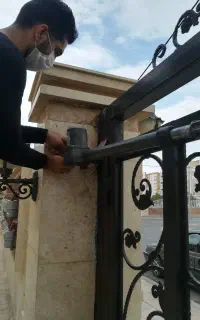 مرکز تعمیرات درب برقی بازویی و جکی پارکینگ