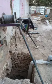 مقنی و چاه کن
