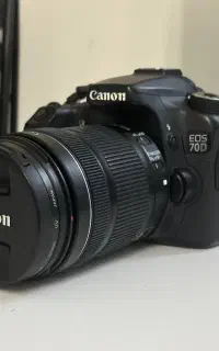 دوربین Canon مدل 70D با لنز 18-135 و سه‌پایه فروشی