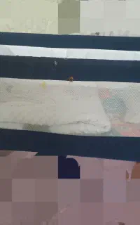تخت نوزاده کنار مادر