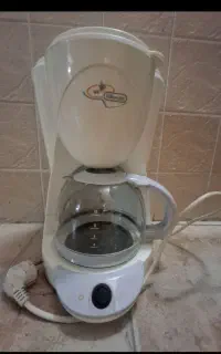 قهوه ساز اصل دلونگی