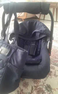 دو عدد پشه بند و نی نی لای لای و یک ساک وتاب