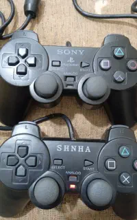 دسته پلی استیشن و موس کامپیوتر