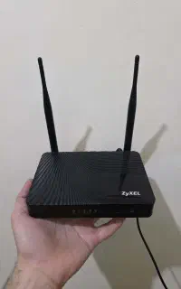 مودم روتر +ADSL2 زایکسل مدل DEL1312-T10B