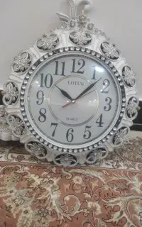 ساعت دیواری دو طرفه