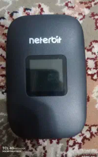مودم جیبی دارای کابل شارژر و کلگی و کیف مودم