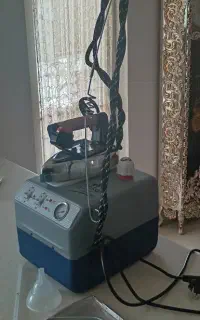 اتو مخزن دار