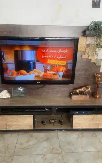 تلویزیون الجی ۴۷اینج با میز چوب