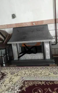 بخاری و آینه شمع دان