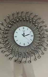 ساعت دیواری طرح  خورشیدی