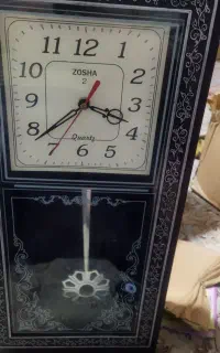 ساعت دیواری پاندول دار
