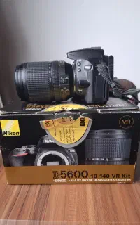 دوربین عکاسی نیکون مدل d5600 و لنز نیکون 18140
