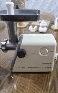 چرخ گوشت و آبمیوه گیری