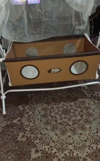 گهواره کودک تمیز ودارای پشه بند