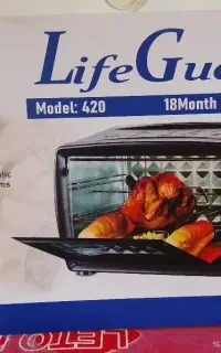 مایکروفر دارای جوجه گردان life grand