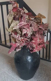 گل مصنوعی همراه گلدان سفالی