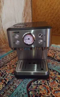 دستگاه اسپرسو نوا خونگی و ویترین مغازه