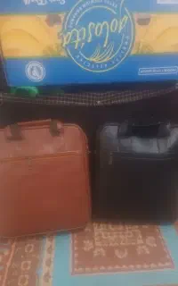 ۲عددکیف مشکی وقهوه ای